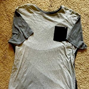 Billabong shortsleeved pocket tee shirt, no stains or tears.